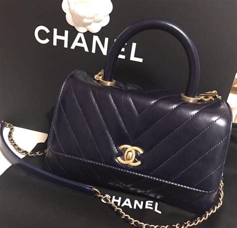 chanel 16s navy chevron|Chanel handbags uk.